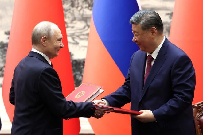 Prezidenti Ciny a Ruska upozornili dalsie mocnosti na militarizaciu a zakon dzungle